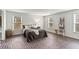 Bedroom showcasing brick flooring, natural light, and neutral walls at 5130 Forest Hills Ct, Cumming, GA 30041