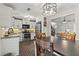 Modern kitchen featuring stainless steel appliances, ample counter space, and open layout at 5130 Forest Hills Ct, Cumming, GA 30041