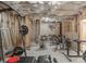 Spacious unfinished basement transformed into a home gym, ready for your fitness equipment at 1213 Fairwinds Dr, Loganville, GA 30052