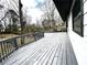 A spacious back deck with gray paint at 1298 Belmont Se Ave, Smyrna, GA 30080