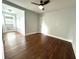 Bedroom with hardwood floors, ceiling fan, and natural light at 1298 Belmont Se Ave, Smyrna, GA 30080