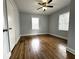 Cozy bedroom with hardwood floors and natural light from the window at 1298 Belmont Se Ave, Smyrna, GA 30080