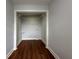 Walk-in closet features wood floors, shelving, and laundry hookups at 1298 Belmont Se Ave, Smyrna, GA 30080