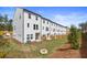 Backyard featuring a small grass area, and partial wooden fence, offering outdoor space at 3151 Washburn Sw St, Atlanta, GA 30354