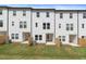 Backyard with a small grass area and wooden fence, offering privacy and outdoor space at 3151 Washburn Sw St, Atlanta, GA 30354