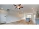 Open-concept living room leading to a staircase and featuring a kitchen at 3151 Washburn Sw St, Atlanta, GA 30354