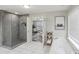 Luxurious bathroom featuring a glass-enclosed shower and separate soaking tub at 1307 Calderwood Se Ct, Smyrna, GA 30080