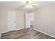 Bedroom featuring modern flooring, neutral paint, and ample closet space at 1307 Calderwood Se Ct, Smyrna, GA 30080