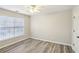 Bedroom with modern flooring, neutral paint, and ample natural lighting at 1307 Calderwood Se Ct, Smyrna, GA 30080
