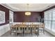 Formal dining room with wainscoting, a modern chandelier, and space for seating at 1307 Calderwood Se Ct, Smyrna, GA 30080