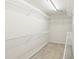 Spacious walk-in closet with multiple shelves for plenty of storage at 1307 Calderwood Se Ct, Smyrna, GA 30080