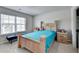 Cozy bedroom featuring natural light and comfortable furnishings at 2137 Post Grove Rd, Snellville, GA 30078