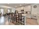 Contemporary kitchen featuring a central island, breakfast bar, and stainless steel appliances at 2137 Post Grove Rd, Snellville, GA 30078