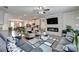 Stylish living room featuring modern fireplace, open layout, and comfortable seating area at 2137 Post Grove Rd, Snellville, GA 30078