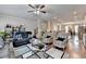 Spacious living room with hardwood floors, comfortable seating, and an open floor plan at 2137 Post Grove Rd, Snellville, GA 30078