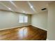 Bright living room featuring hardwood floors and large window at 2745 Marco Nw Dr, Atlanta, GA 30318