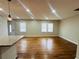 Open-concept kitchen and living room with hardwood floors at 2745 Marco Nw Dr, Atlanta, GA 30318