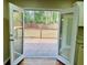 View of the wood deck through double doors at 2745 Marco Nw Dr, Atlanta, GA 30318