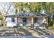 Charming bungalow-style house with a welcoming front porch and freshly painted exterior at 1108 Sw Welch Sw St, Atlanta, GA 30310