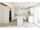 Updated kitchen with stainless steel appliances, white cabinets, and a center island at 1108 Sw Welch Sw St, Atlanta, GA 30310