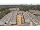 Aerial view of community with a central pool, walkways, and landscaping with the city skyline in the background at 1336 Rosen Rd, Brookhaven, GA 30319