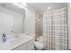 Well-appointed bathroom with a shower-tub combination, vanity with storage, and modern fixtures providing functionality and style at 1336 Rosen Rd, Brookhaven, GA 30319
