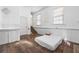 Bedroom with hardwood flooring offers natural light and a simple layout, ready for your personal touch at 1444 Norman Berry Dr, East Point, GA 30344