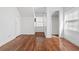 Bright bedroom with hardwood floors offers natural light, closet space, and potential for customization at 1444 Norman Berry Dr, East Point, GA 30344