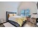 Bedroom featuring a tufted headboard bed with a plush rug, and natural light at 117 Kiara Ln, Stockbridge, GA 30281