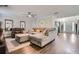 Spacious living room with hardwood floors, ample seating, and lots of natural light at 117 Kiara Ln, Stockbridge, GA 30281