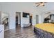 This spacious bedroom features hardwood floors, vaulted ceilings, and large closet space at 117 Kiara Ln, Stockbridge, GA 30281