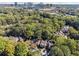 Aerial view of homes nestled among lush trees, offering privacy at 30 Dunwoody Springs Dr, Atlanta, GA 30328