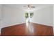 Well-lit bedroom with hardwood floors and natural light from windows at 30 Dunwoody Springs Dr, Atlanta, GA 30328