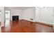 Bright living room featuring hardwood floors and a fireplace, with easy access to other rooms at 30 Dunwoody Springs Dr, Atlanta, GA 30328