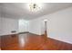 Spacious living room with hardwood floors, neutral walls, and abundant natural light at 30 Dunwoody Springs Dr, Atlanta, GA 30328
