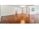 Spacious living room featuring gleaming hardwood floors, an open layout, and neutral walls at 30 Dunwoody Springs Dr, Atlanta, GA 30328