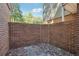 Small brick patio with walls at 30 Dunwoody Springs Dr, Atlanta, GA 30328