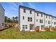 A view of the backyard and the exterior of a new construction home at 3200 Bateman Dr, Atlanta, GA 30354