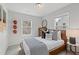 Charming bedroom with a basketball decor, a cozy bed, and natural light from the windows at 3200 Bateman Dr, Atlanta, GA 30354