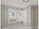 Bright bedroom with a large window, closet and modern flooring at 1088 Hubbard Sw St, Atlanta, GA 30310