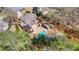 An aerial view highlighting the custom pool, lush landscaping, and outdoor living space of this exceptional home at 6715 Brookline Ct, Cumming, GA 30040