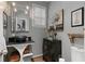 Stylish half-bathroom with a unique vessel sink, decorative mirror, and modern decor at 6715 Brookline Ct, Cumming, GA 30040