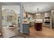 Gourmet kitchen with a view to breakfast area with a view and stainless steel appliances at 6715 Brookline Ct, Cumming, GA 30040