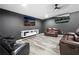 Finished basement featuring a contemporary entertaining space with comfortable seating and TV at 6117 Summerstone Ln, Douglasville, GA 30135