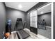 Finished basement featuring a home gym with sliding door at 6117 Summerstone Ln, Douglasville, GA 30135