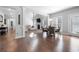 Open-concept dining area leading to a spacious living room at 6117 Summerstone Ln, Douglasville, GA 30135