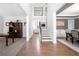 Welcoming foyer with hardwood floors, staircase, and open layout at 6117 Summerstone Ln, Douglasville, GA 30135