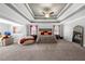 Large main bedroom features a coffered ceiling, sitting area, and generous square footage at 6117 Summerstone Ln, Douglasville, GA 30135