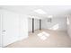 Finished basement featuring neutral carpet, white walls, and recessed lighting at 6582 Malvin Dr, Mableton, GA 30168