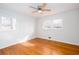 Bedroom featuring gleaming hardwood floors, neutral paint, and a ceiling fan at 6582 Malvin Dr, Mableton, GA 30168